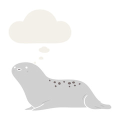 cartoon seal and thought bubble in retro style