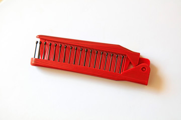 Red plastic comb