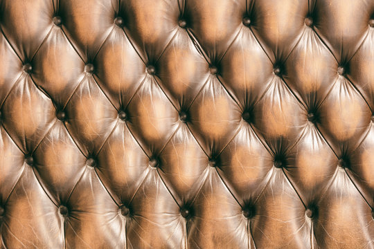 Pattern Of Chesterfield Buttoned Brown Leather