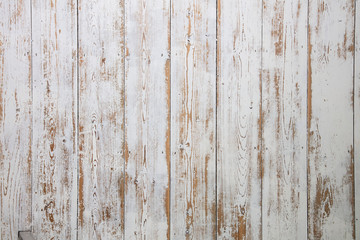 White wooden floorboards. Distressed worn floorboard background painted white