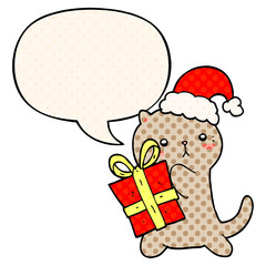 cute cartoon cat carrying christmas present and speech bubble in comic book style