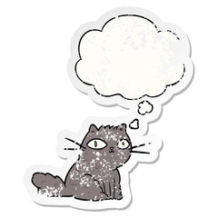 cartoon cat and thought bubble as a distressed worn sticker