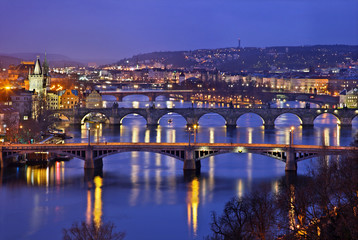 Fototapeta na wymiar Bridges on Vltava (Moldava) river, Prague, Czech Republic. The one in the middle is the famous Charles' bridge. View from Letna gardens 