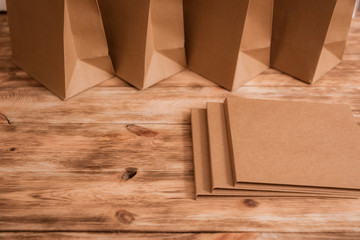 two brown kraft bag on wood white desk