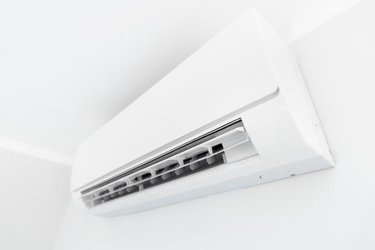 Air conditioner system on white wall room