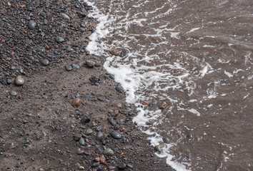 Lava Sand am Strand