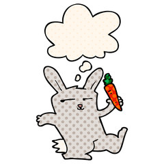 cartoon rabbit with carrot and thought bubble in comic book style