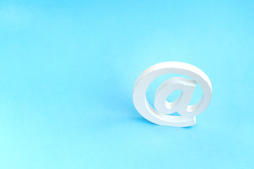 Email symbol on blue background. Concept for internet, contact us and e-mail address