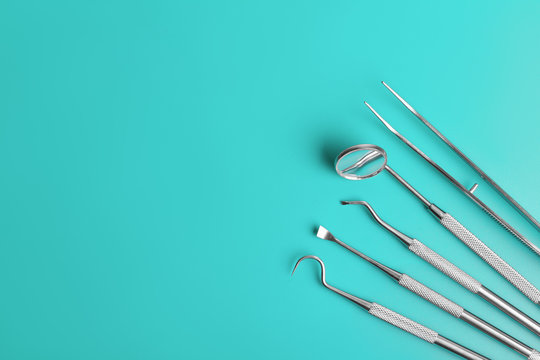 Dental Tools On Blue Background Top View