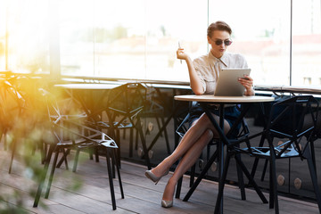 Portrait of a Successful Business woman Using Digital Tablet.