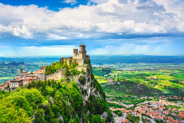 San Marino, medieval tower on a rocky cliff and panoramic view of Romagna - obrazy, fototapety, plakaty