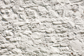 Whitewashed stone wall suitable for a background