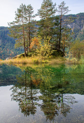 Fototapeta premium Reflections of the sunrise at the Eibsee