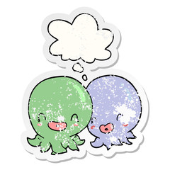 two cartoon octopi  and thought bubble as a distressed worn sticker
