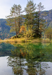 Fototapeta premium Reflections of the sunrise at the Eibsee