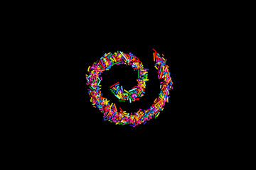 Fototapeta premium spiral made of colorful sprinkles isolate on black background