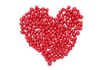 Fototapeta na wymiar Heart shape from redcurrant. Love theme concept for Valentine's background and love theme.