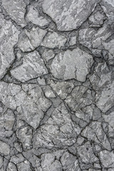 Stone floor texture. Harmonic pattern of slate tiles at the floor.