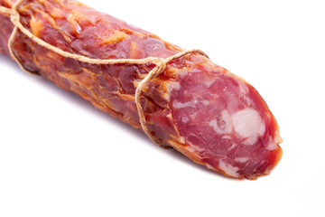juicy and tasty smoked sausage isolated on white background
