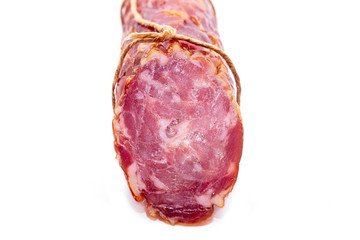 juicy and tasty smoked sausage isolated on white background