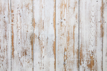 Fototapeta na wymiar White wooden floorboards. Distressed worn floorboard background painted white