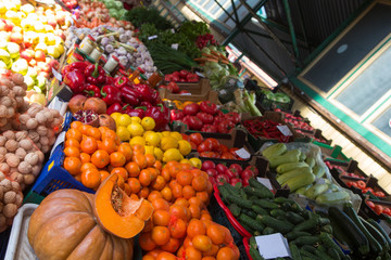 pumpkin and apelsins and other vegetables in sale in outdoor farmer market