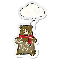 cartoon bear and thought bubble as a distressed worn sticker