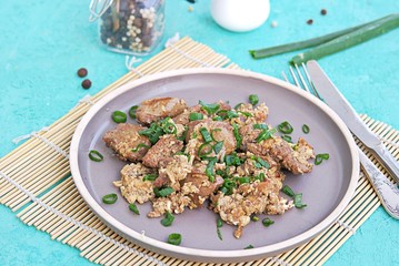Fried Chicken Liver with Scramble Egg on Gray Clay Plate