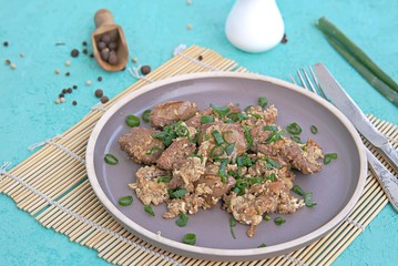 Fried Chicken Liver with Scramble Egg on Gray Clay Plate