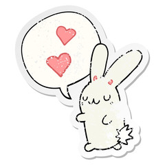 cartoon rabbit in love and speech bubble distressed sticker