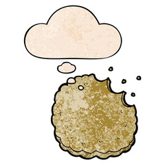 cartoon biscuit and thought bubble in grunge texture pattern style