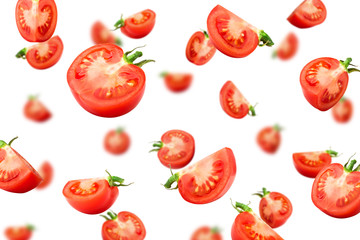 Falling tomato isolated on white background, selective focus - obrazy, fototapety, plakaty
