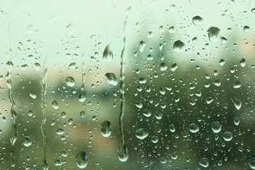 Wet window glass. Raindrops close up. Background. Texture.