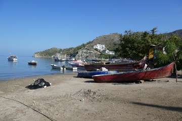 Fototapeta na wymiar The fishing boat on the beach at morning time.