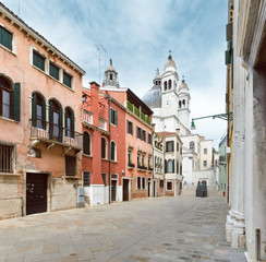 Naklejka na ściany i meble The street with the church in Venice