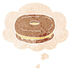 cartoon biscuit and thought bubble in retro textured style