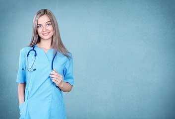 Young man doctor holding stethoscope