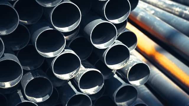 Stacks of Pipes on a Construction Site