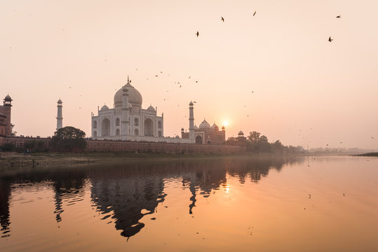 Taken from a boat on the River Yamuna behind the Taj Mahal at sunset, Agra, Uttar Pradesh