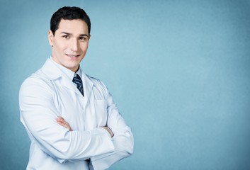 Young man doctor holding stethoscope