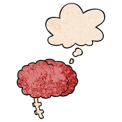 cartoon brain and thought bubble in grunge texture pattern style