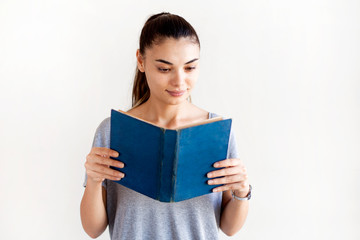 Young woman reading book