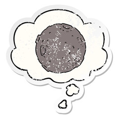 cartoon moon and thought bubble as a distressed worn sticker