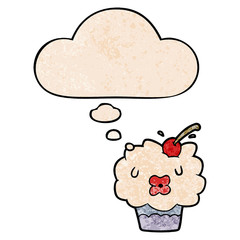 cartoon cupcake and thought bubble in grunge texture pattern style