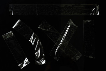 Set of transparent tape pieces