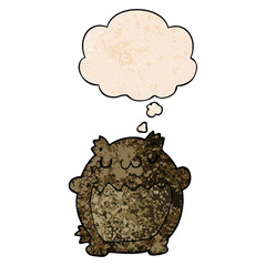 cartoon bear and thought bubble in grunge texture pattern style