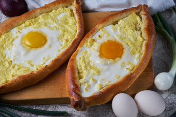 Ajar traditional khachapuri. National Georgian cuisine. Khachapuri closeup.