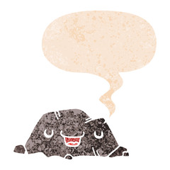 cartoon rock and speech bubble in retro textured style