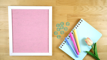 Pink notice board with blank message flatlay and copy space.