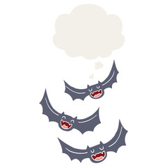 cartoon vampire bats and thought bubble in retro style